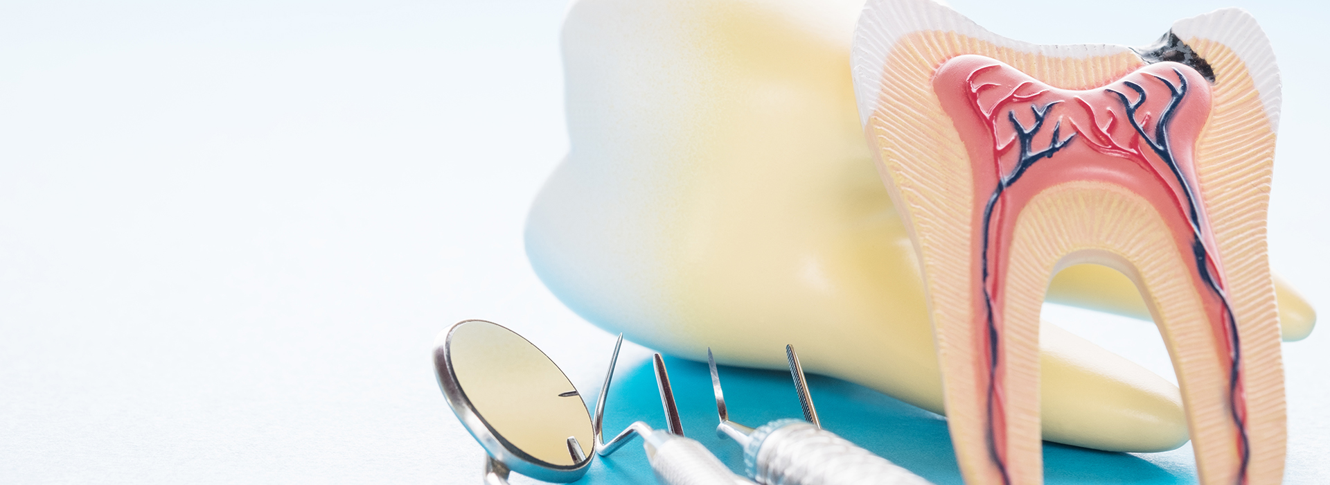 The image shows a toothbrush with toothpaste and an illustration of a tooth with gum disease, placed next to each other against a blue background.